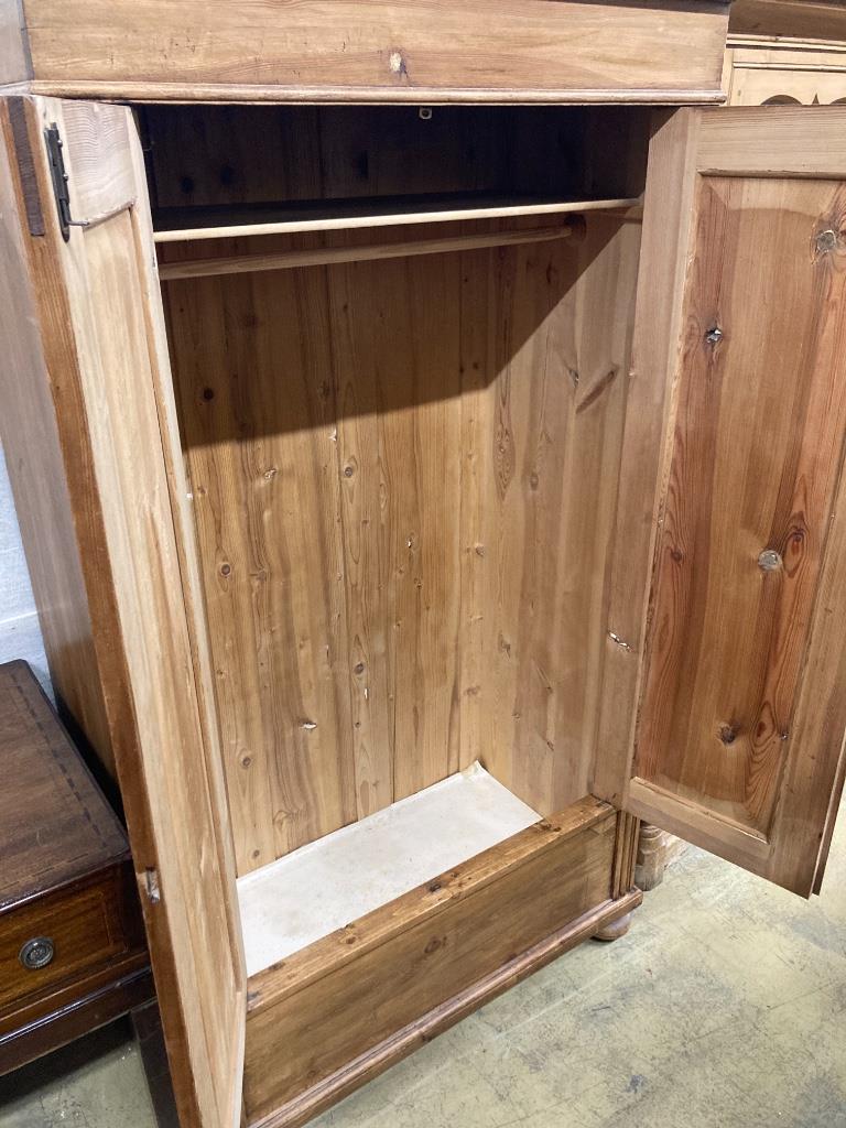 A French pine two door wardrobe, width 109cm, depth 57cm, height 187cm